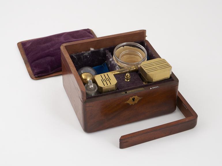 Set of cupping instruments, in wooden case, 19th century