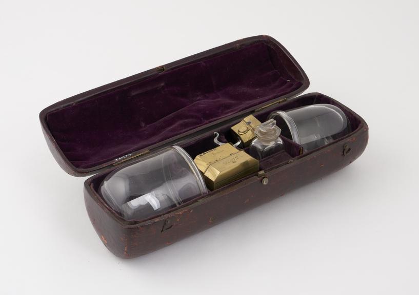 Set of cupping instruments, in leather covered case, by Simpson