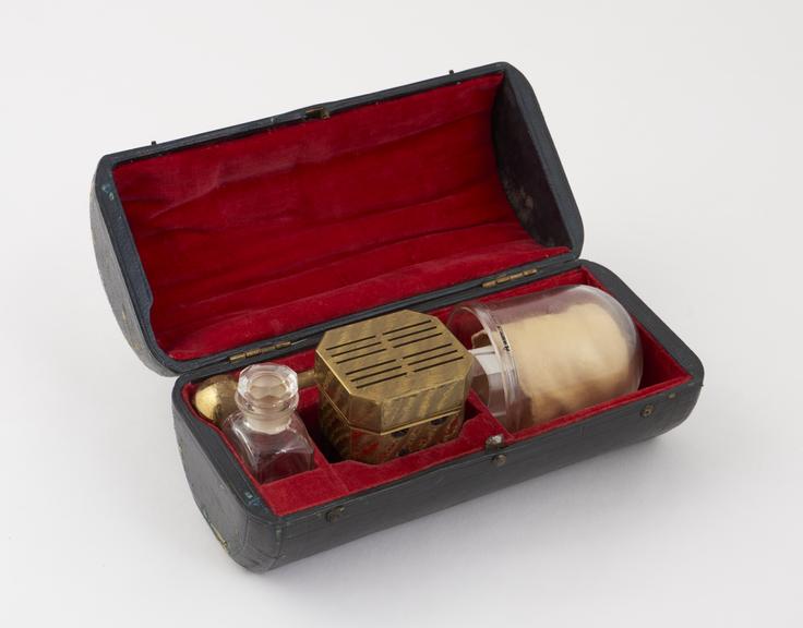 Set of cupping instruments, in leather covered case