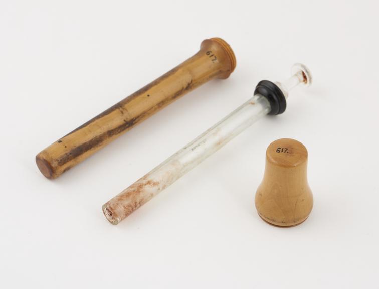 Glass suppository introducer in wooden case, English, 1850-1920