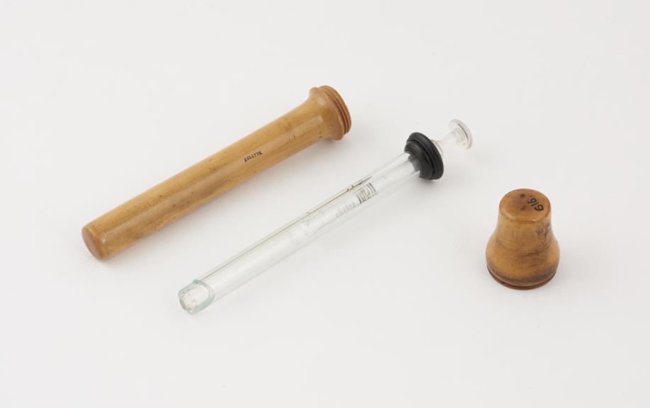 Glass suppository introducer in wooden case, English, 1850-1900