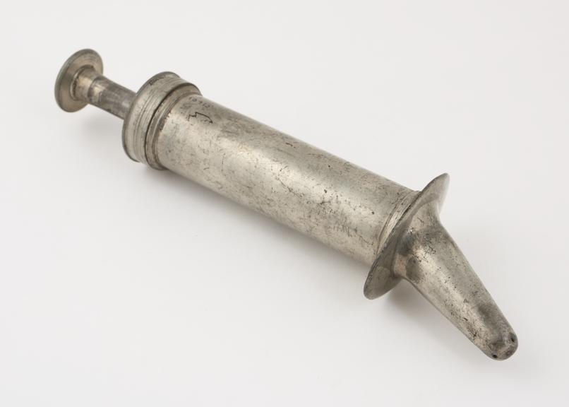 Pewter vaginal syringe, piston action, Hamilton type