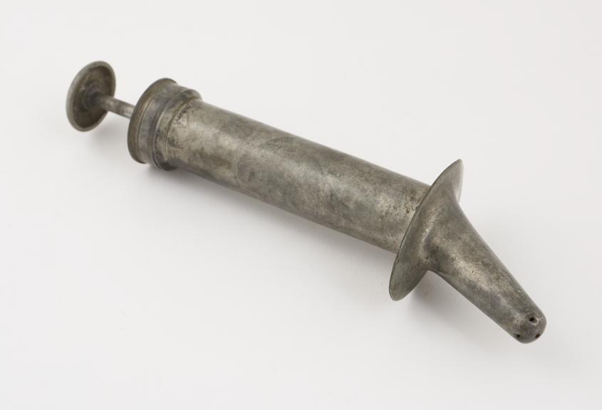 Pewter vaginal syringe, piston action, Hamilton type