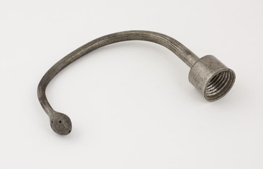 Pewter nozzle from a vaginal syringe