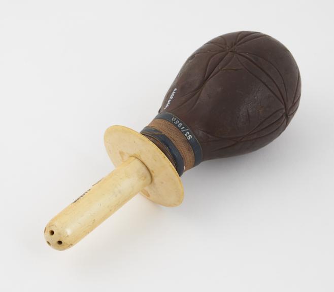 Vaginal syringe with leather bulb