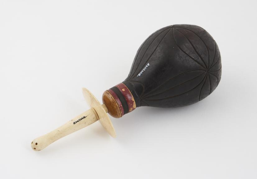 Vaginal syringe with leather bulb