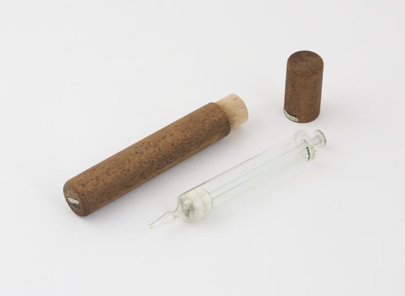 Glass urethral syringe in wooden case