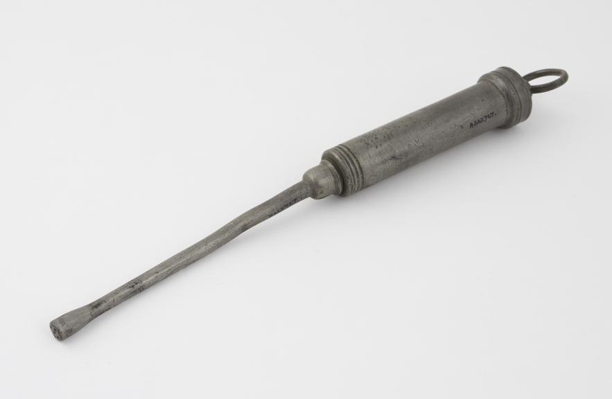 Pewter, piston-action vaginal syringe