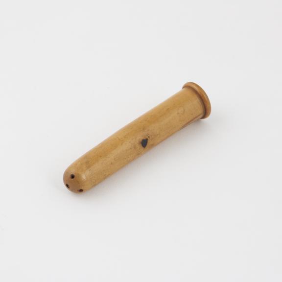 Wooden nozzle from vaginal syringe