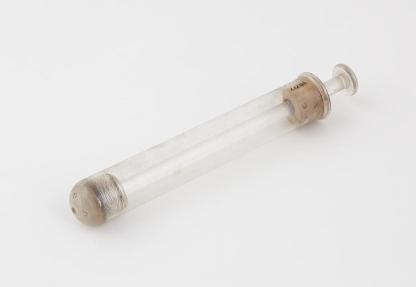 Glass piston-action vaginal syringe, European, 1870-1920