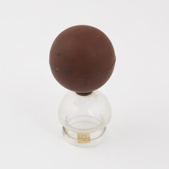 Cupping glass with rubber bulb attached, for dry cupping