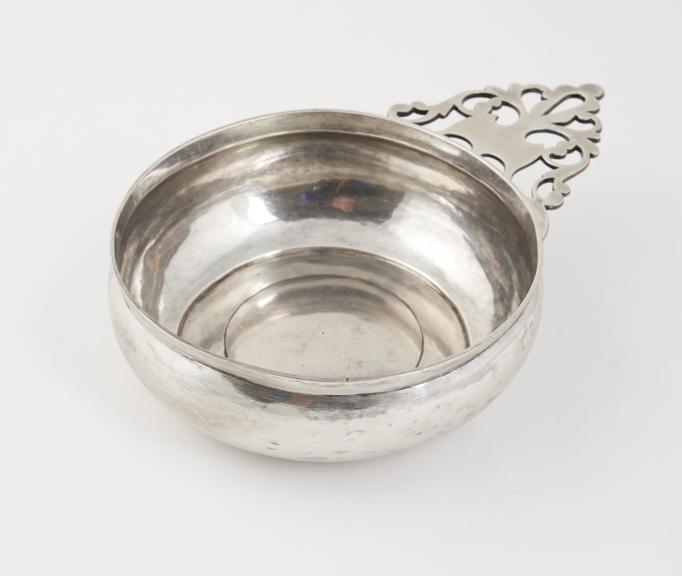 Silver bleeding bowl, circular with pierced handle on one side