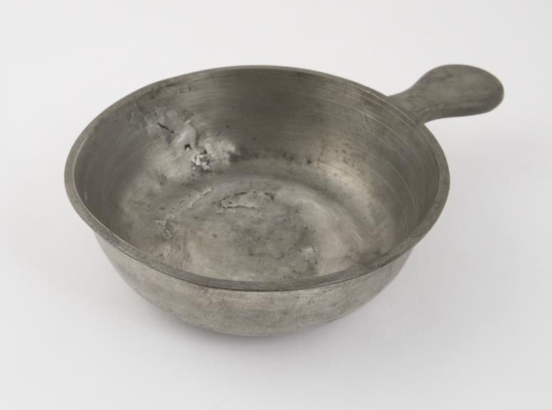 Pewter bleeding bowl, graduated, London, 1855