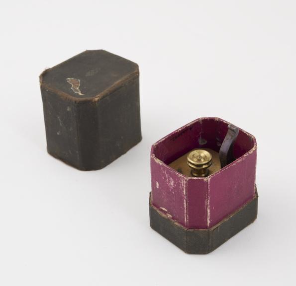 Brass scarificator, with 12 lancets, in box, 19th century