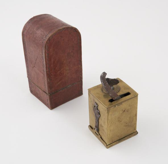 Brass scarificator, with 13 lancets, in leather covered case