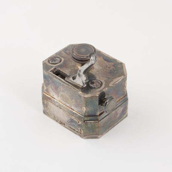 Scarificator with twelve lancets, silver and steel, English