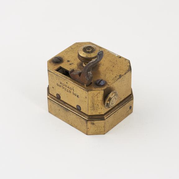 Scarificator with twelve lancets, made by Millikin, 301 Strand