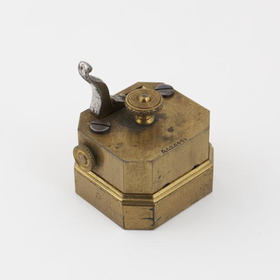 Scarificator with twelve lancets, brass and steel, English