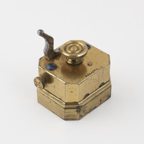 Scarificator with twelve lancets, brass and steel, English