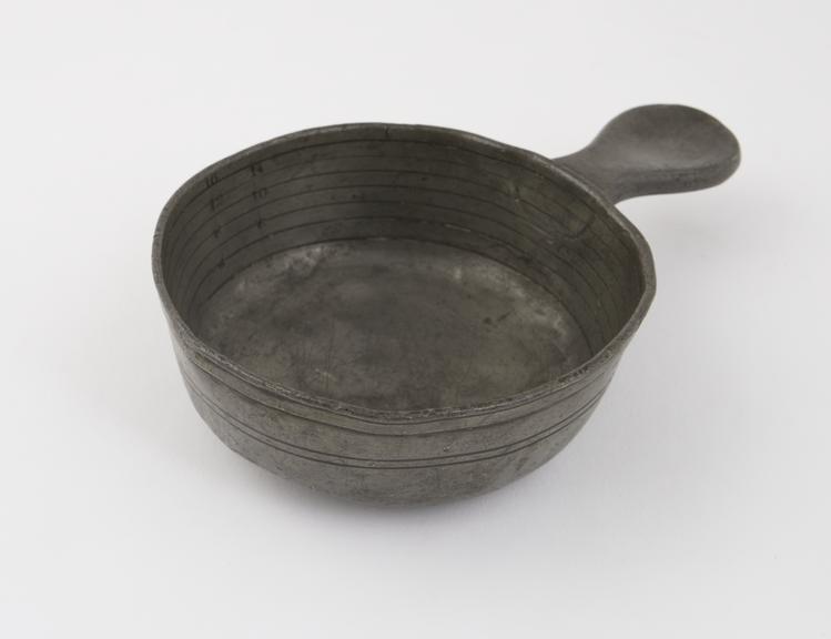 Pewter bleeding bowl, graduated, made by Compton and Co