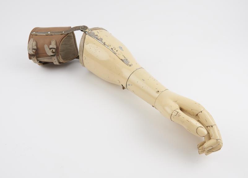 Artificial arm with knife accessory for eating