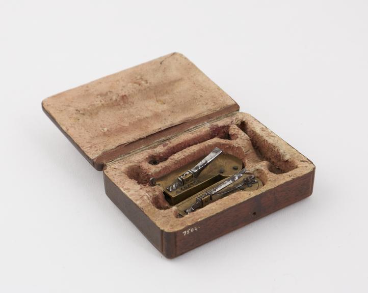 Brass automatic lancets, 2, in wooden case, 18th century