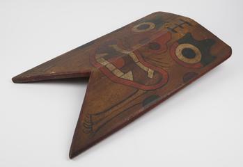 Wooden sign painted with a demon's face, China