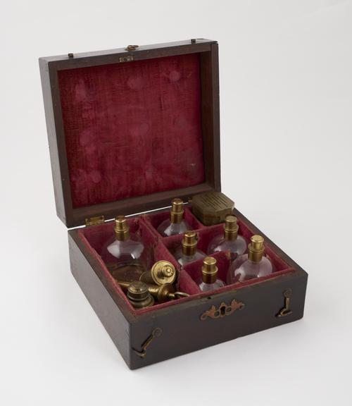 Set of cupping instruments in wooden case, by W