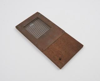 Wooden grid slide with metal grill attachment