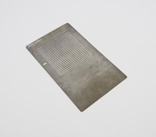 Metal grill attachment from grid slide