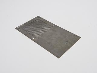 Metal grill attachment from grid slide