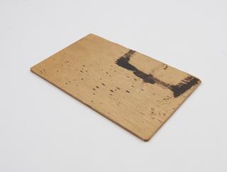 Wooden slide, with black ink staining
