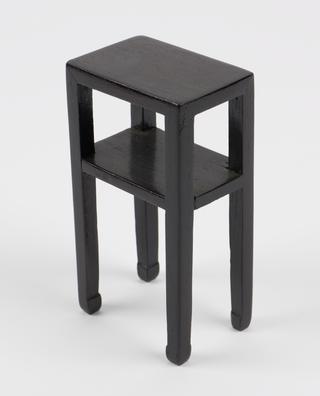 Black shelves for model of Chinese pharmacy