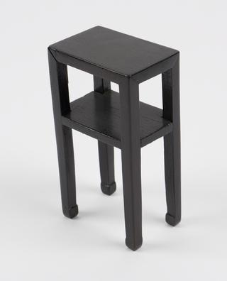 Black shelves for model of Chinese pharmacy