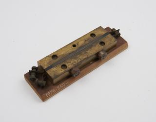 One of two experimental selenium cells, mounted on wood