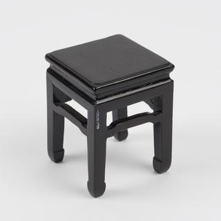 Black side table for model of Chinese pharmacy