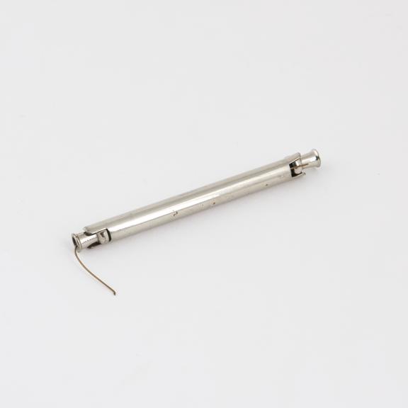 Two hypodermic needles in tubular holder, nickel plated brass