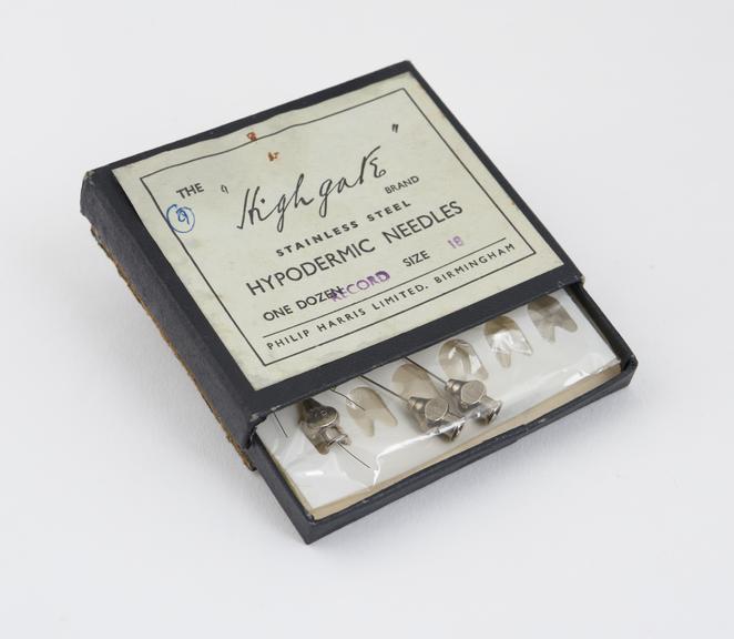 Nine hypodermic needles in original carton, by Philip Harris