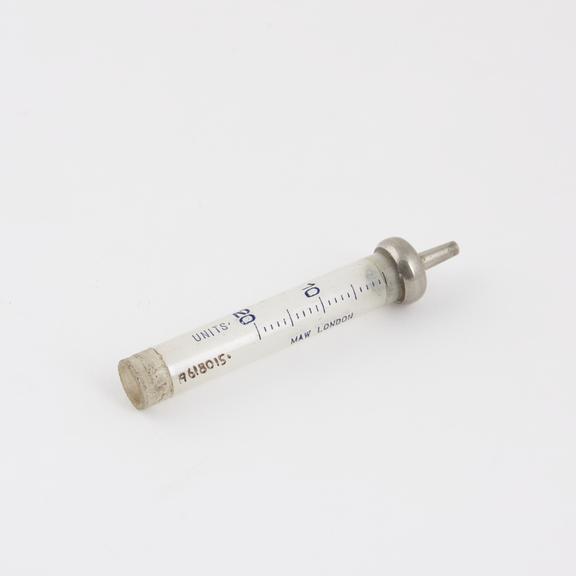 Hypodermic syringe, head and barrel only, glass and metal