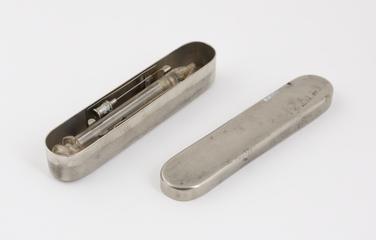 Hypodermic syringe, all glass, in nickel plated br