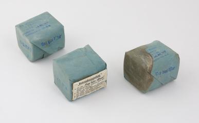 3 rectangular blue paper packets