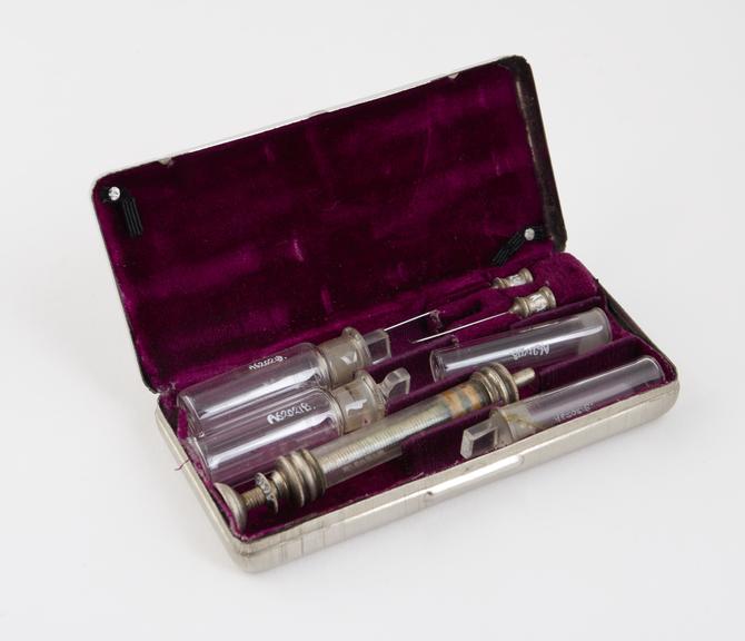 Hypodermic syringe, glass and silver plated brass