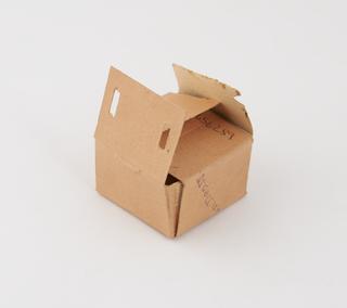 Roll of zinc sticking plaster on a tin dispenser