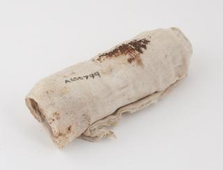 Large rolled bandage of gauze