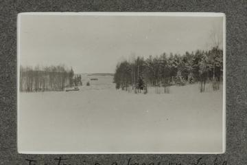 Vuoksenniska, Finland; Tug Towing a barge on the Lake Sarnia