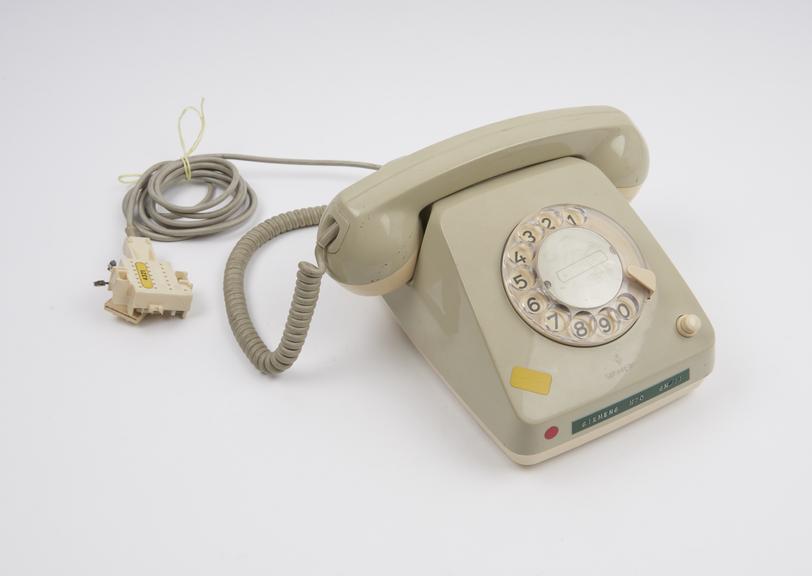 Telephone handset, dial, two-tone grey and cream