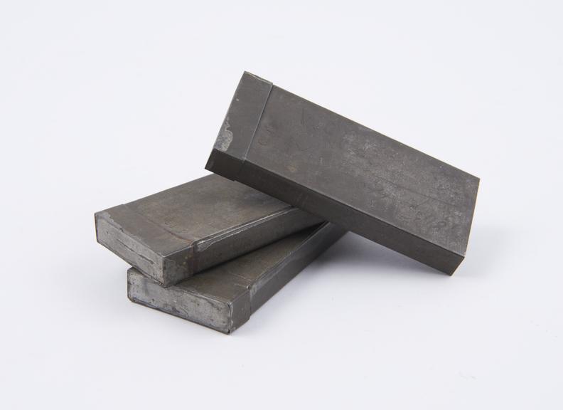 Three small zinc boxes