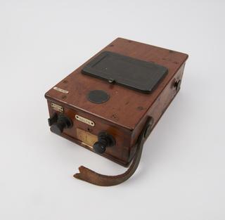 Twin instrument comprising moving coil ammeter and moving coil voltmeter with a range-change switch