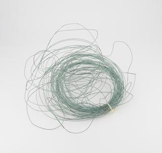 Coil of green copper wire
