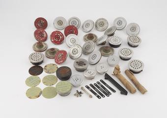 Telephone transmitter insets and ear pieces